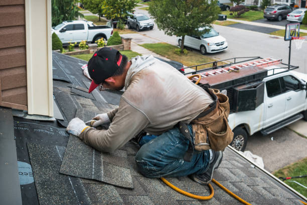 Professional Storm Damage Roof Repair technician working in Millington, NJ